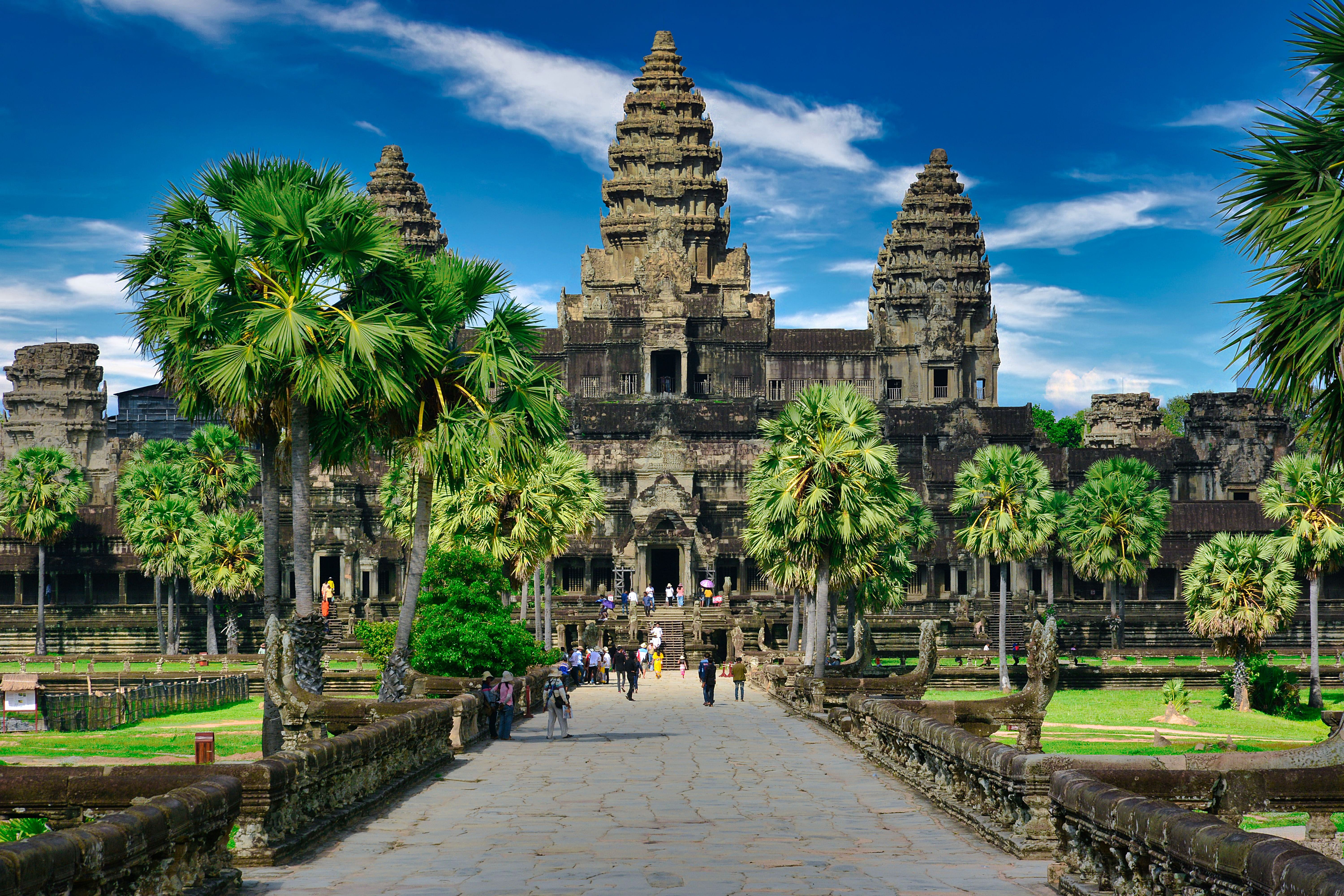 Cambodia minimum wage, Cambodia payroll, Cambodia salary, Cambodia EOR.Angkor Wat temple with palm trees